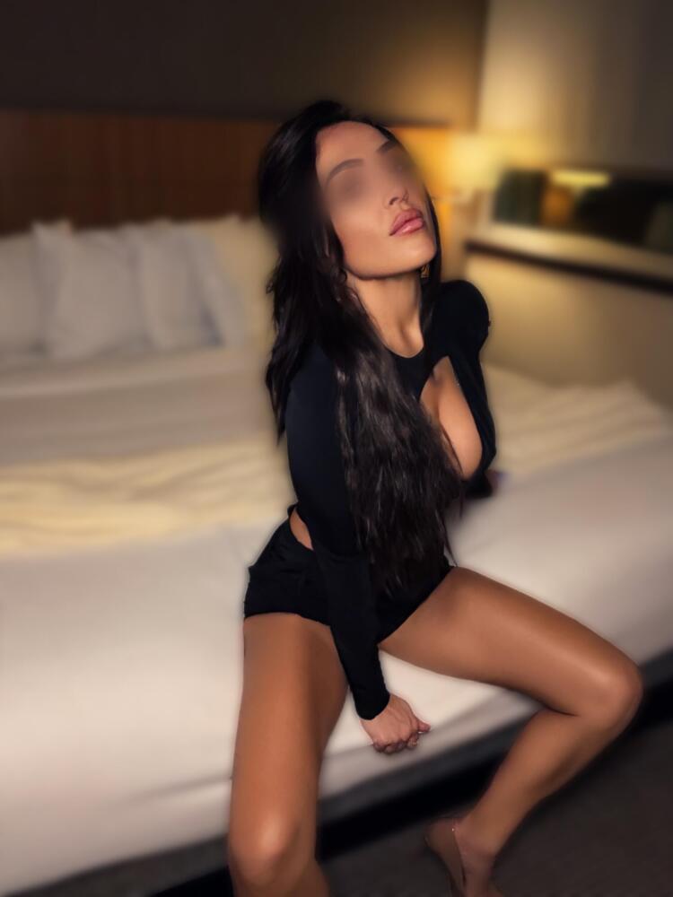 seatting in black dress